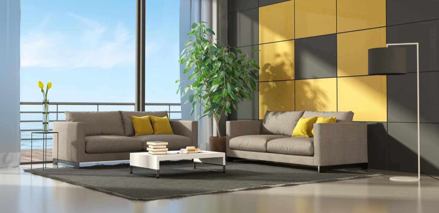 Modern gray and yellow living room with two couches